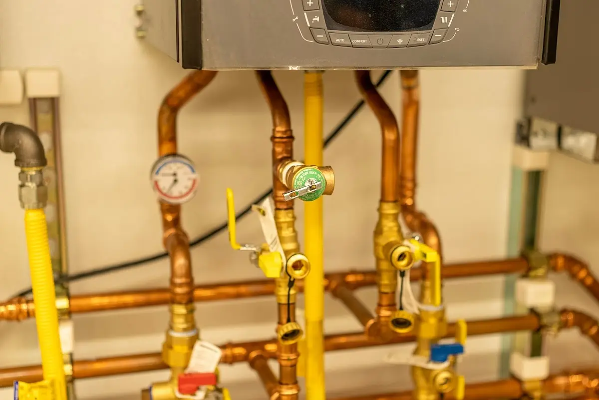 Licensed technician providing Water Heater Installation for a homeowner in Bangor Base