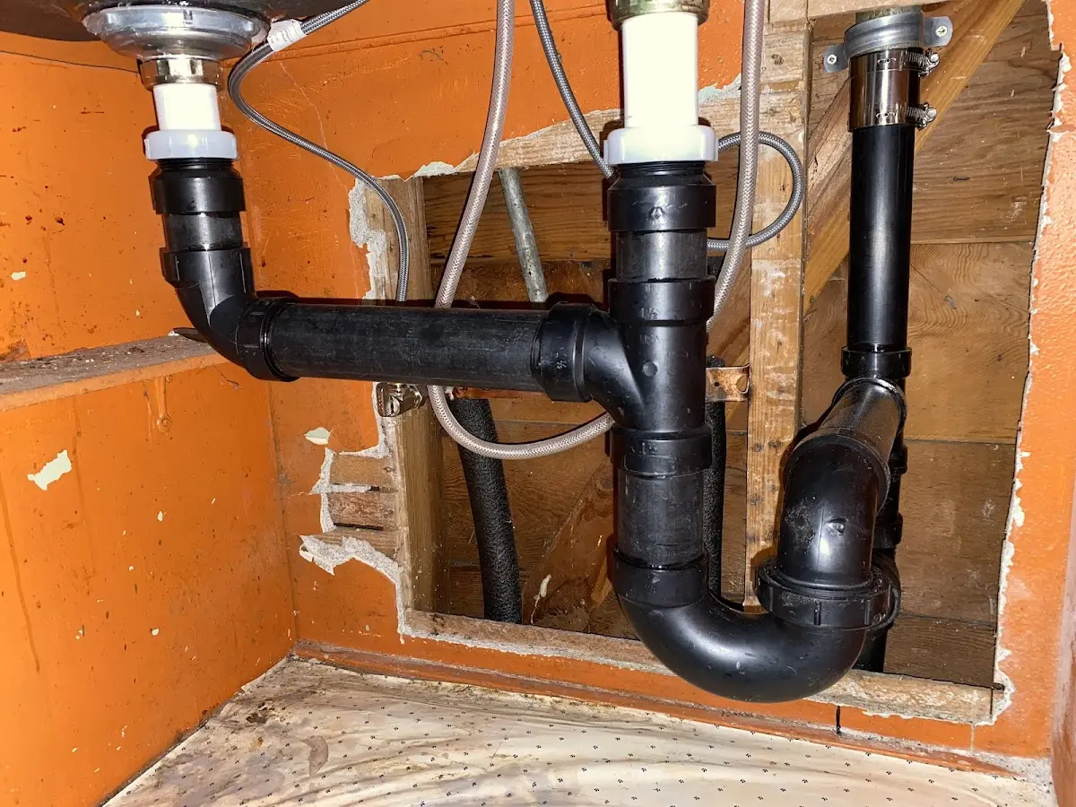 Professional Garbage Disposal Repair equipment and tools on the job in Bangor Base
